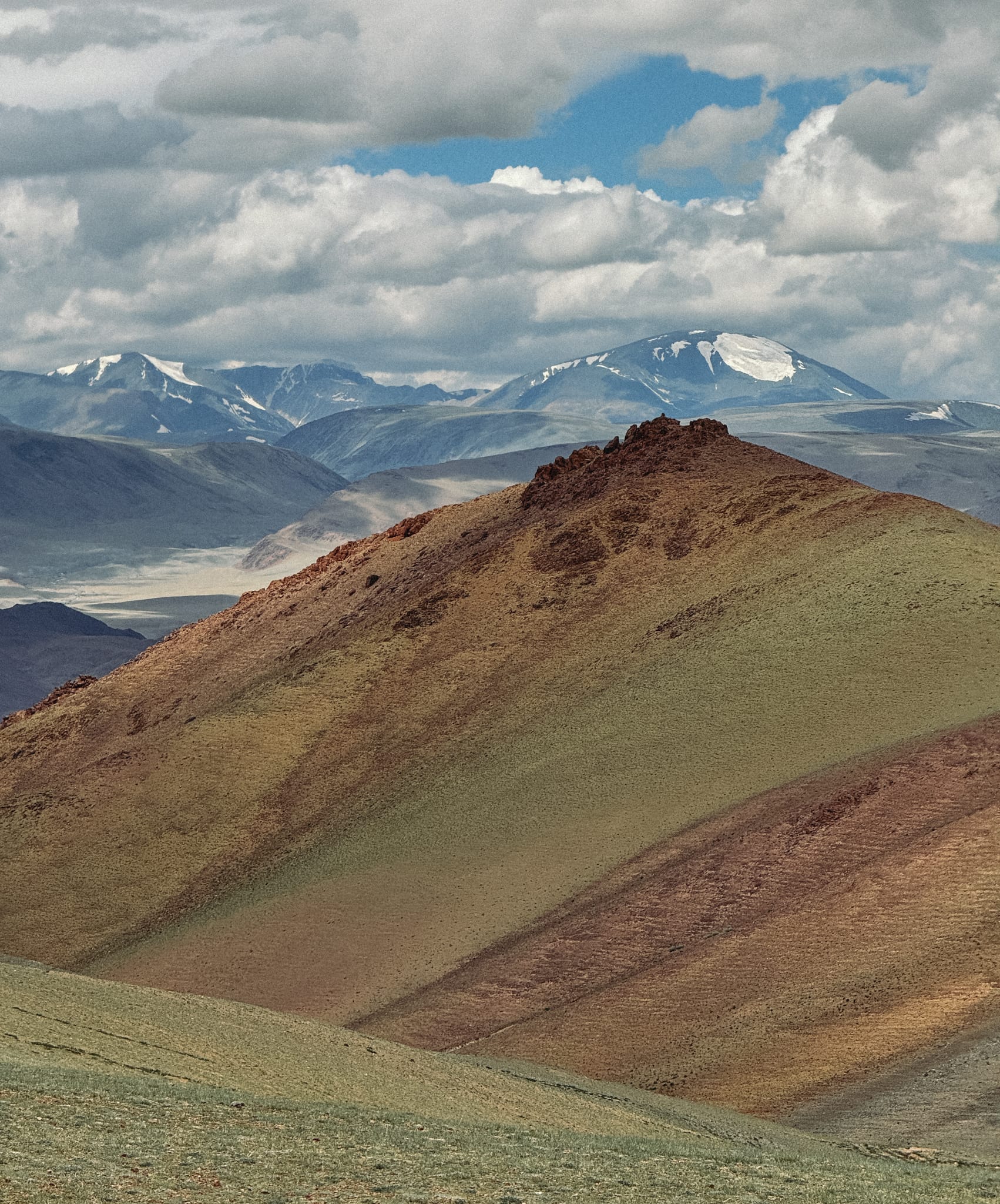 altai mountains snowy in the back and desert in the front